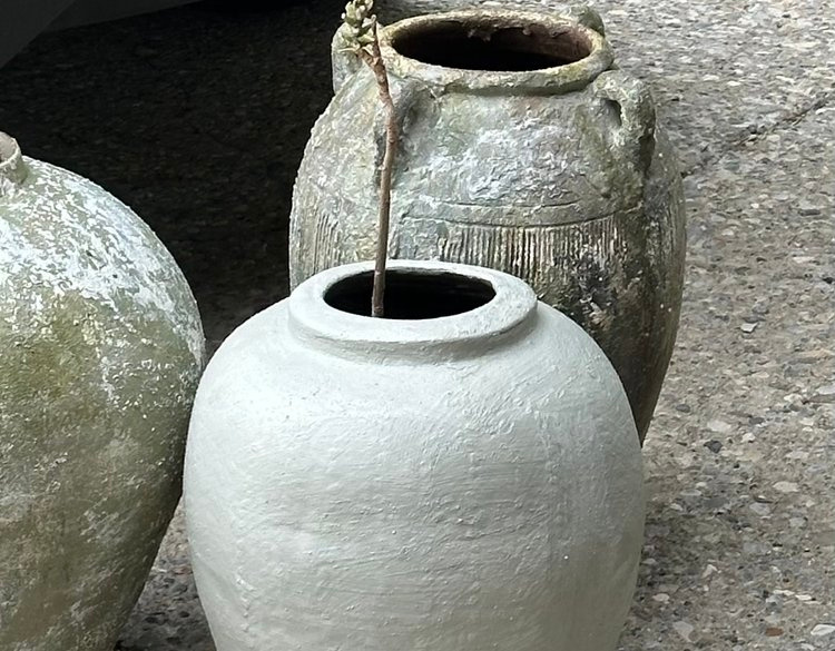 Close-up of textured handcrafted planters for Elbow Park Exterior